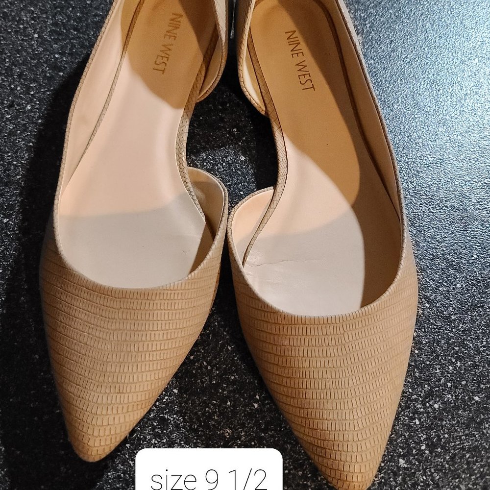 Tan pointy-toed ballet flats